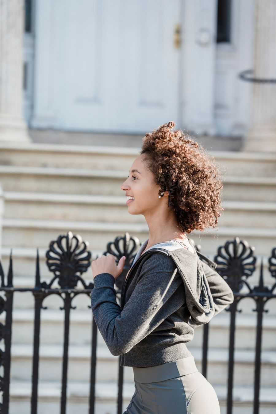 Black woman jogging outdoors